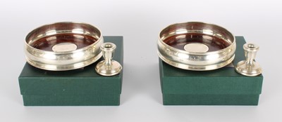 Lot 21 - A Pair of Elizabeth II Silver Mounted Mahogany Bottle Coasters