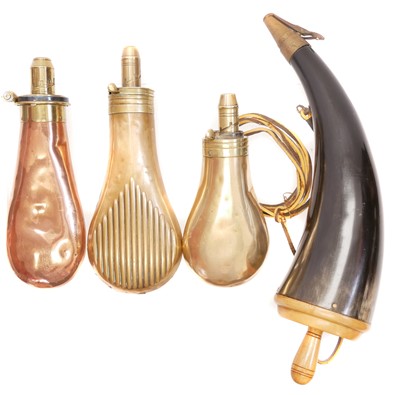 Lot 82 - Three copper and brass powder flasks, one...