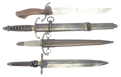 Lot 175 - Four reproduction knives / daggers, to include...