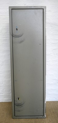 Lot 447 - Steel gun cabinet with two sets of keys, seven...
