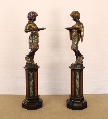 Lot A Rare Pair of 19th Century Venetian 'Blackamoor' Figures on Integral Stands