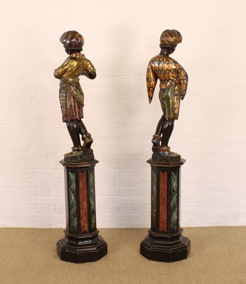 Lot A Rare Pair of 19th Century Venetian 'Blackamoor' Figures on Integral Stands