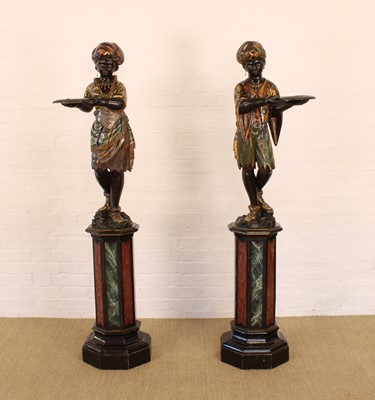 Lot A Rare Pair of 19th Century Venetian 'Blackamoor' Figures on Integral Stands