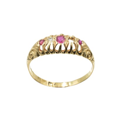 Lot An 18ct gold, ruby & diamond boat ring