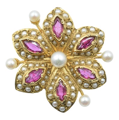 Lot 67 - A ruby and seed pearl flower brooch, set in 9ct gold