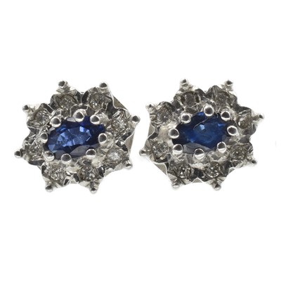 Lot 59 - Tanzanite and diamond stud earrings, set in gold