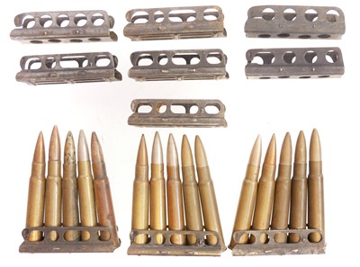 Lot 523 - Fifteen WWII era .303 rounds on ten clips. UK...
