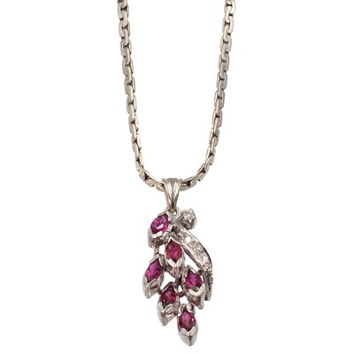 Lot 127 - A Ruby and diamond cluster pendant, set in 14ct and suspended from a 9ct white gold chain