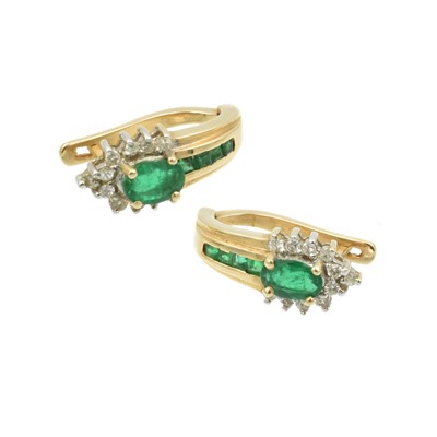 Lot 133 - Emerald and diamond stylised cluster earrings set in 18ct gold