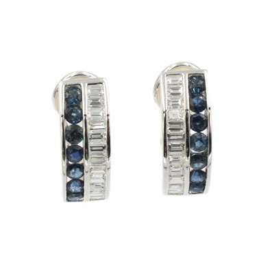 Lot 124 - Sapphire and diamond earrings set in 18ct yellow gold