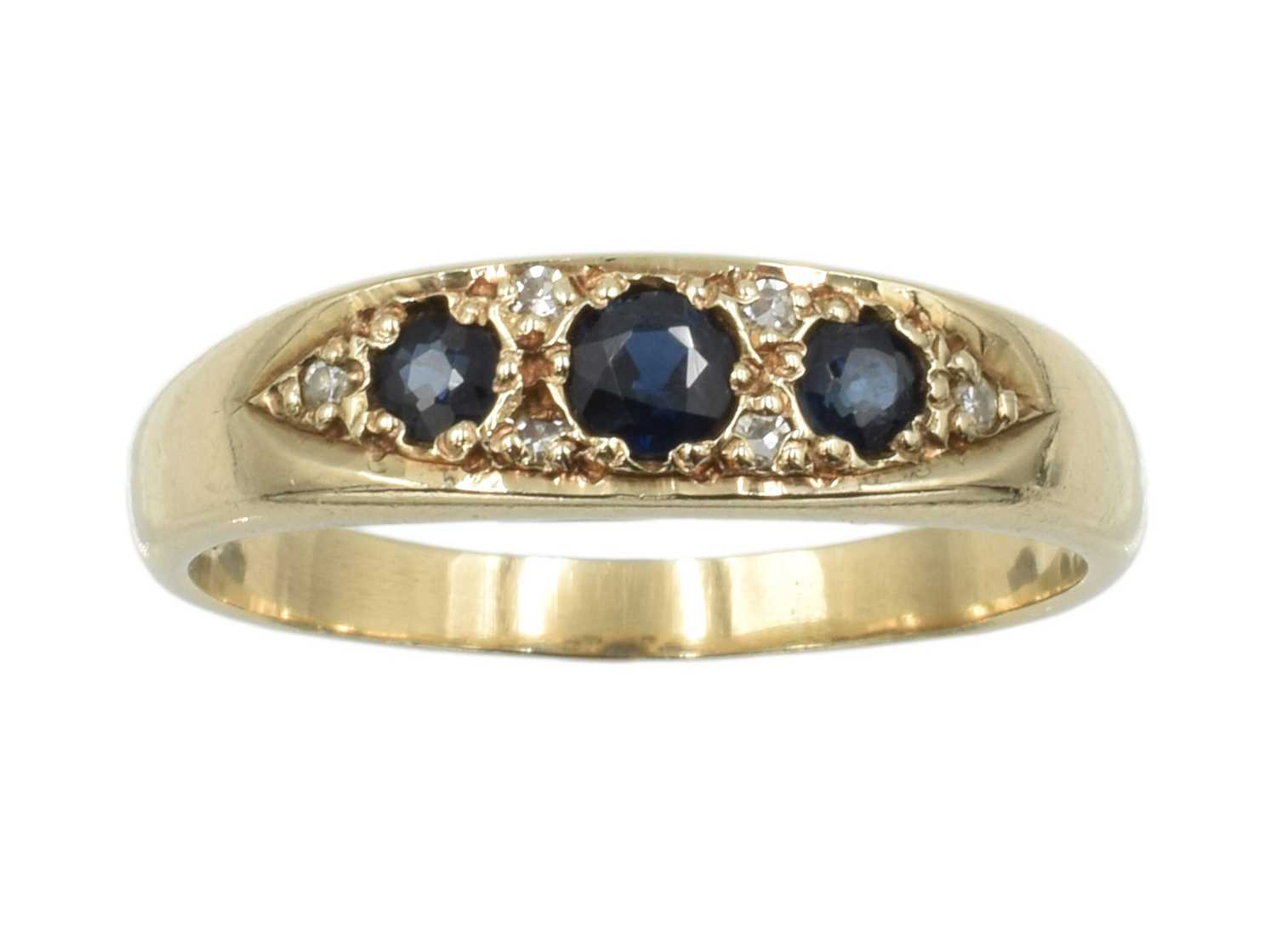 Lot 226 - A 9ct gold, sapphire and diamond boat ring