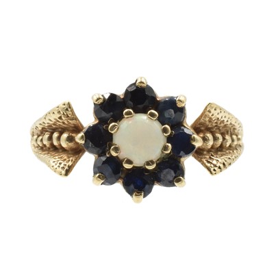 Lot 195 - A 9ct gold sapphire and opal cluster ring