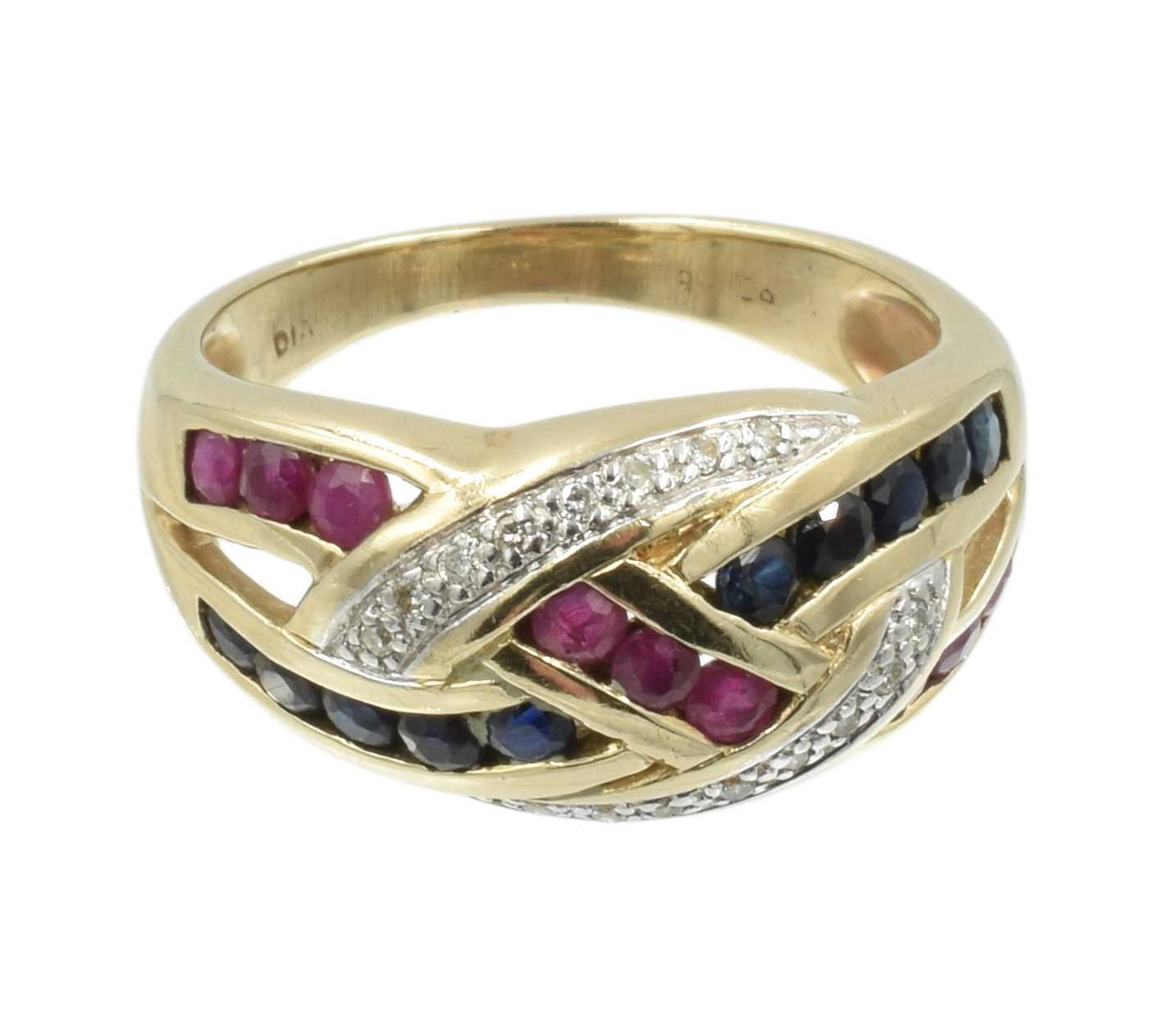 Lot A 9ct gold sapphire, ruby and diamond crossover ring