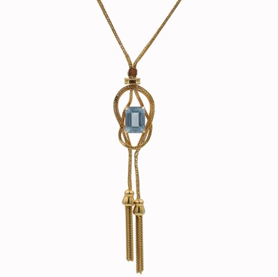 Lot An 18ct and blue topaz tassel pendant
