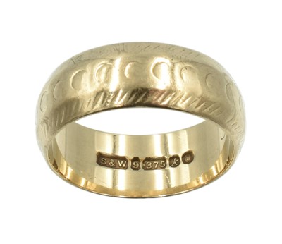 Lot 157 - A 9ct yellow gold wide wedding band