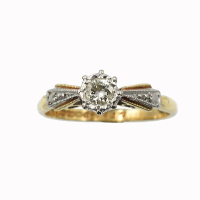 Lot An 18ct gold and diamond solitaire ring