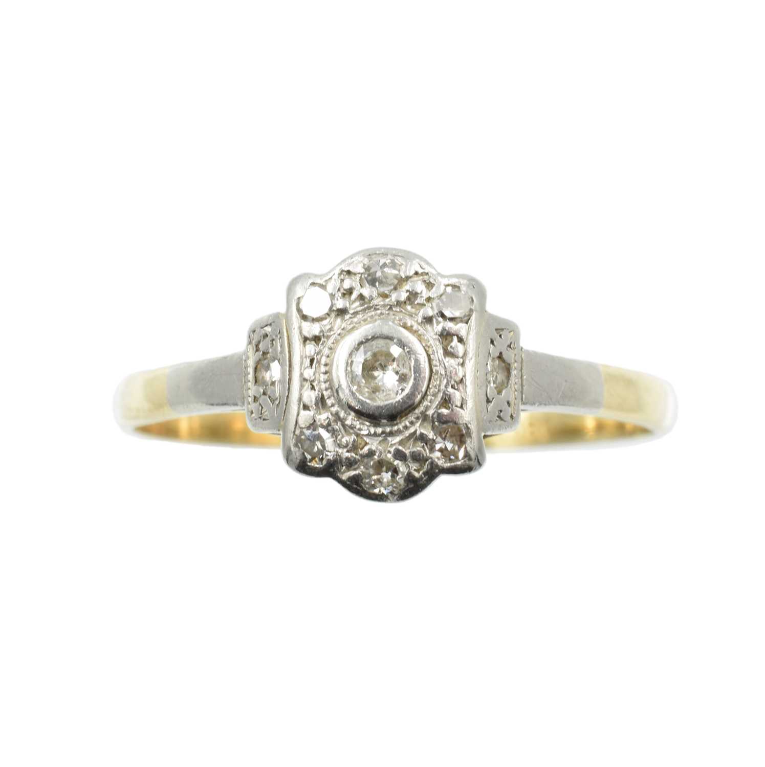Lot 25 - An 18ct gold and diamond low set ring