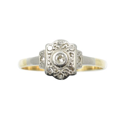 Lot An 18ct gold and diamond low set ring