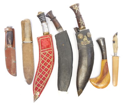 Lot Seven various knives, to include four Kukris,...