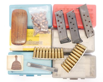 Lot Collection of primed brass and pistol spares,...