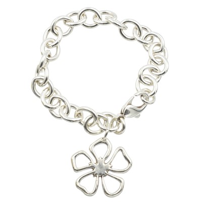 Lot 50 - A Tiffany & Co. sterling silver flower charm bracelet