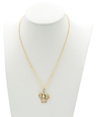 Lot 93 - A seed pearl foliage-style pendant, set in 15ct gold