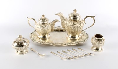 Lot 81 - An Early-Mid 20th Century Indonesian Yogya White Metal Tea Set and Tray