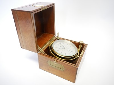 Lot Two day marine Chronometer, the dial signed...