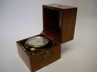 Lot Two day marine Chronometer, the dial signed...
