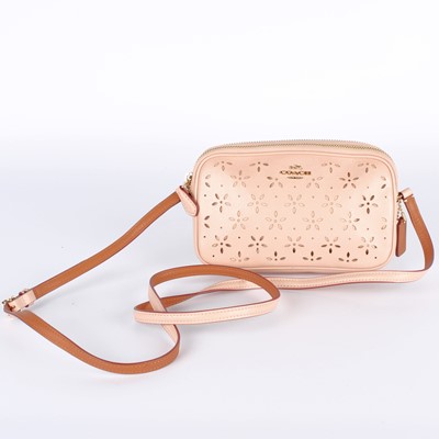 Lot 316 - Coach Pink Mini Cross Body Bag with Petal Design.
