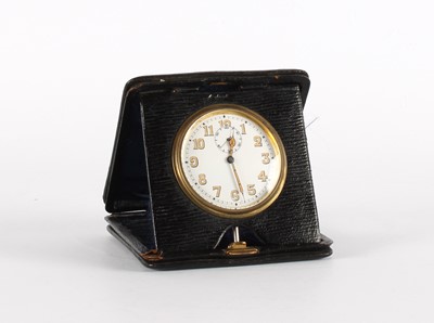 Lot 137 - An Early 20th Century Travelling Watch in Leather Stand/Case