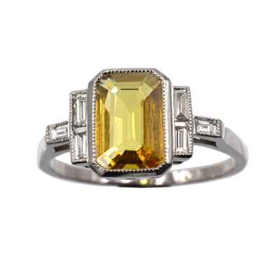 Lot 149 - An Art Deco yellow sapphire and diamond ring, set in platinum