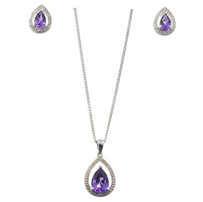 Lot An Amethyst and diamond silver chain set