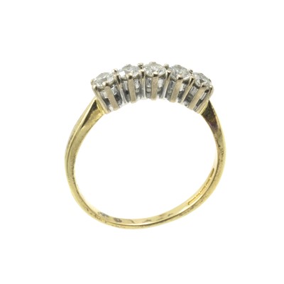 Lot An 18ct yellow gold and diamond five-stone ring