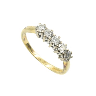 Lot An 18ct yellow gold and diamond five-stone ring