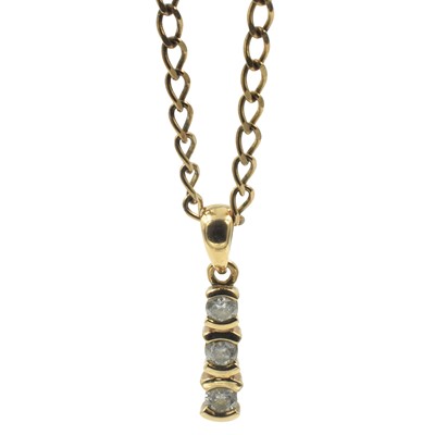Lot A 3-stone diamond drop pendant, set in 9ct gold