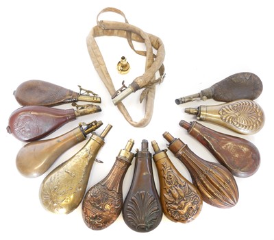 Lot Twelve various powder and shot flasks,...