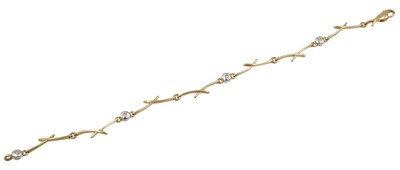 Lot 148 - A 9ct gold "twig style" bracelet, by Beaverbrooks