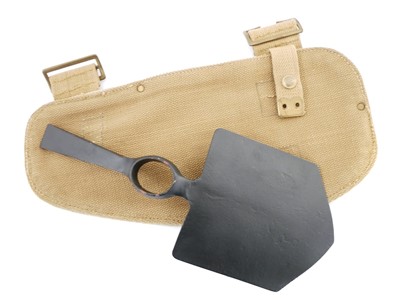 Lot British WWI entrenching tool head and webbing...