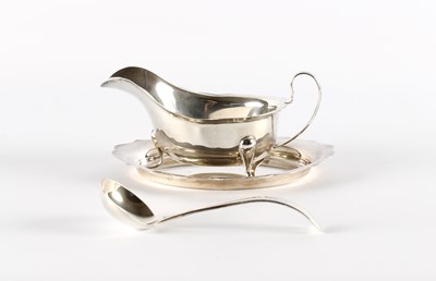 Lot 48 - A George VI Silver Sauce Boat, Stand and Serving Ladle