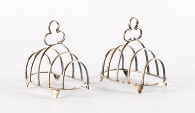 Lot 55 - A Small Pair of George V Silver Four-Division Toast Racks