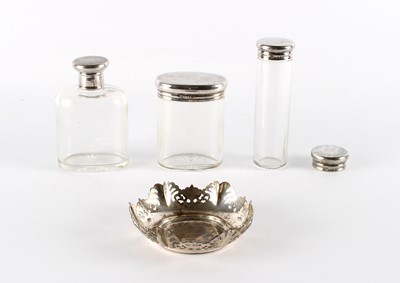Lot 58 - Three Silver Topped Vanity Jars, an Additional Lid and a Silver Bonbon Dish