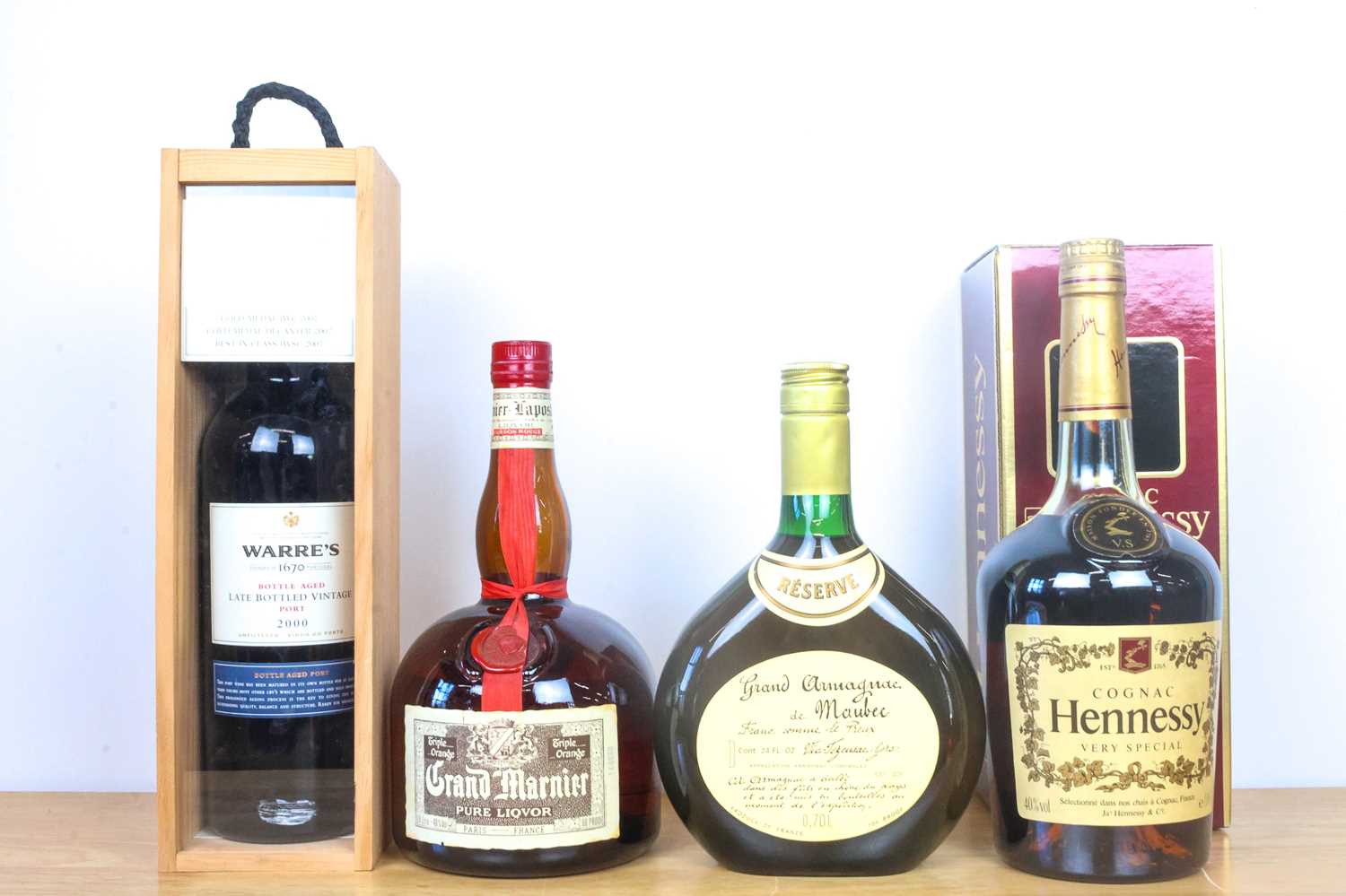 Lot 121 - Four bottles of LBV Port, Cognac, Armagnac and Old Grand Marnier Liqueur
