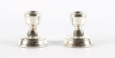 Lot 27 - A Pair of Elizabeth II Silver 'Dwarf' Candlesticks