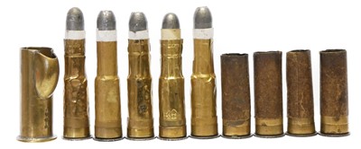 Lot 682 - Five inert .577/450 foil brass cases, one with...