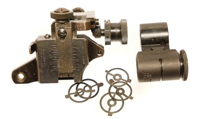 Lot 712 - A.J. Parker model TZ4/47 rifle sight, and a...