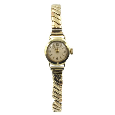 Lot A Buren Grand Prix watch and a Dugena 14ct watch (with rolled gold strap)