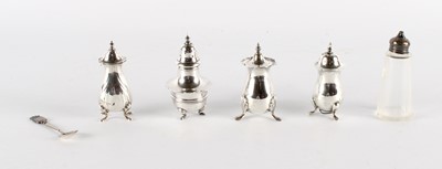 Lot A Group of Four Silver Pepper Shakers