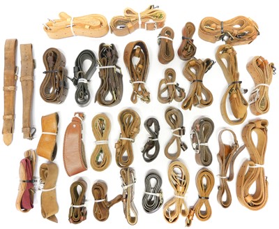 Lot Thirty two leather rifle slings.