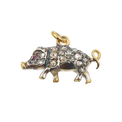 Lot A diamond and ruby pig pendant, set in 14ct gold and silver